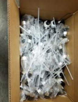 A box full of plastic and plastic objects Description automatically generated